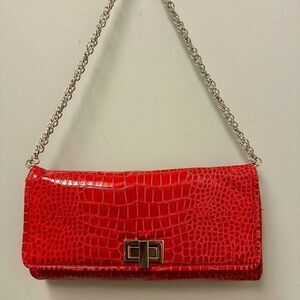 White House Black Market pink, snake embossed shoulder bag.